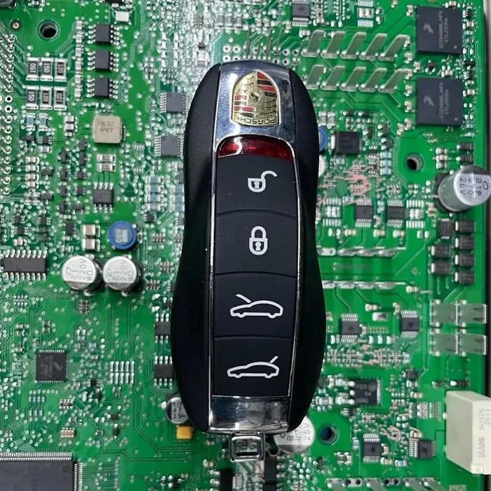 Porsche smart key fob being programmed by Matrix Locksmith