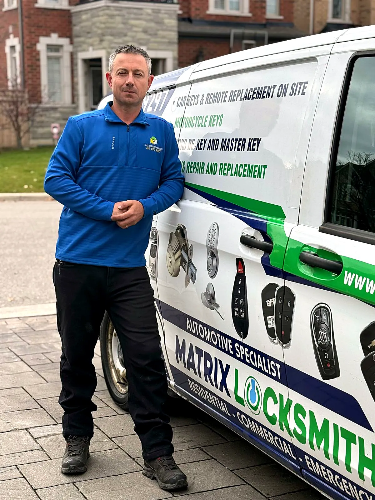 Dani, Matrix Locksmith lead locksmith, leaning on the Matrix mobile locksmith van